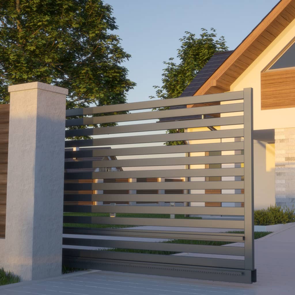 Portail Coulissant Moderne : Design Extérieur Maison & Jardin Maison moderne avec portail coulissant gris à lattes, pilier en béton et clôture bois. Jardin verdoyant baigné de lumière chaude.